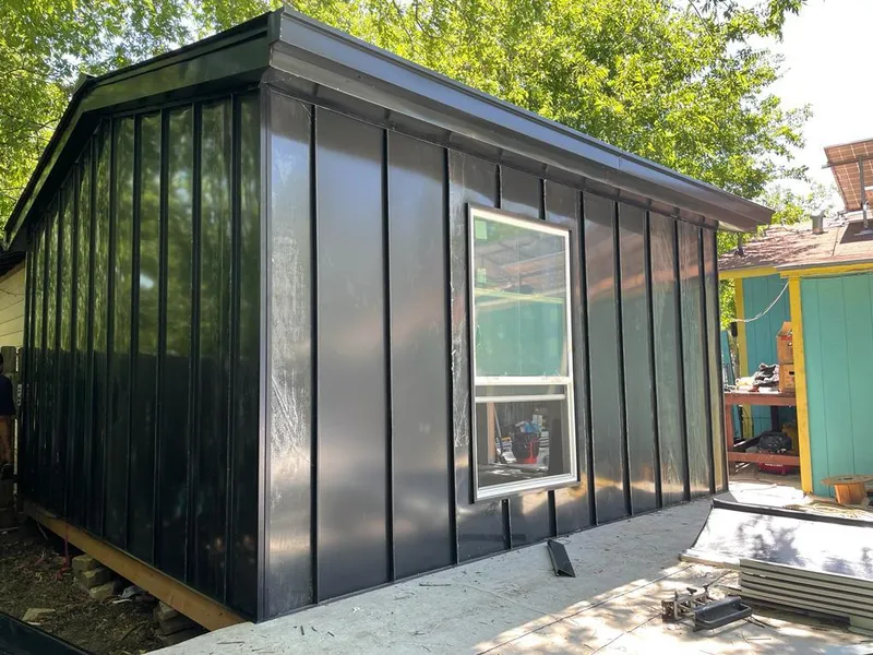 Black standing seam metal wall panels for Roof Inspection in Liberty Lake