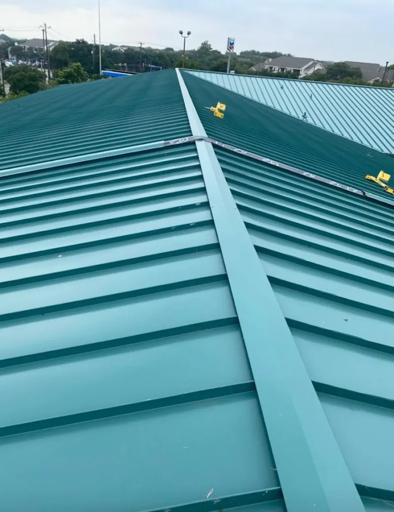 Green commercial metal roof ridge and valley for Metal Roof Repair in Liberty Lake